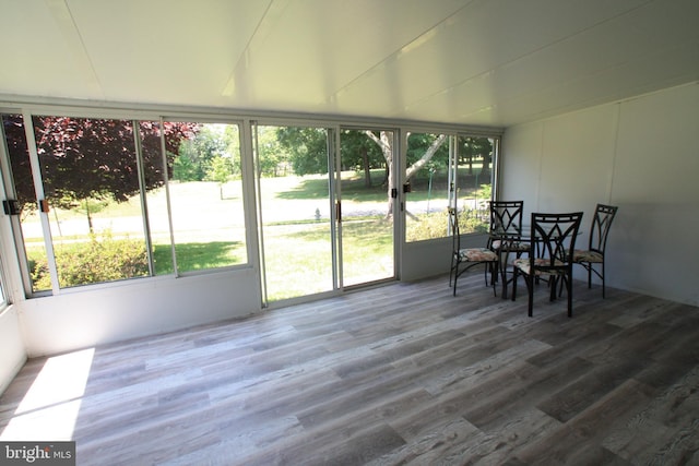 unfurnished sunroom with a healthy amount of sunlight