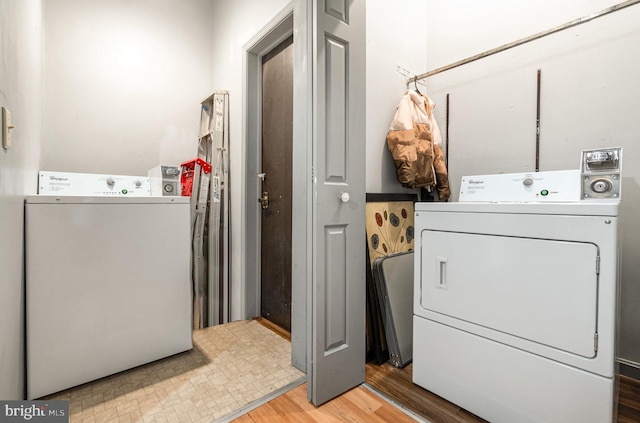 laundry area featuring separate washer and dryer