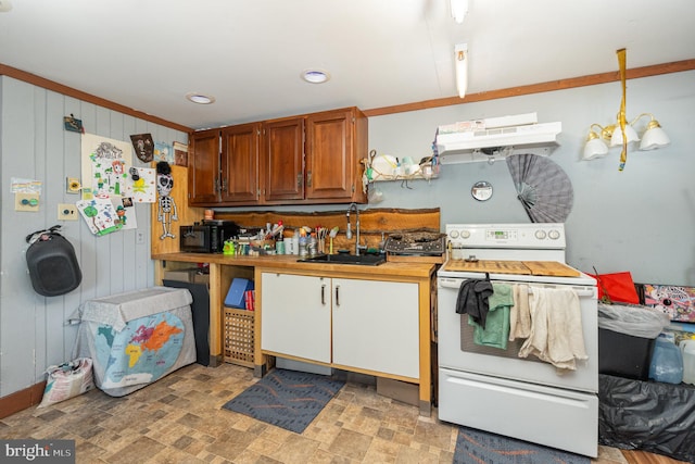 kitchen featuring sink, an inviting chandelier, ventilation hood, white range with electric stovetop, and pendant lighting