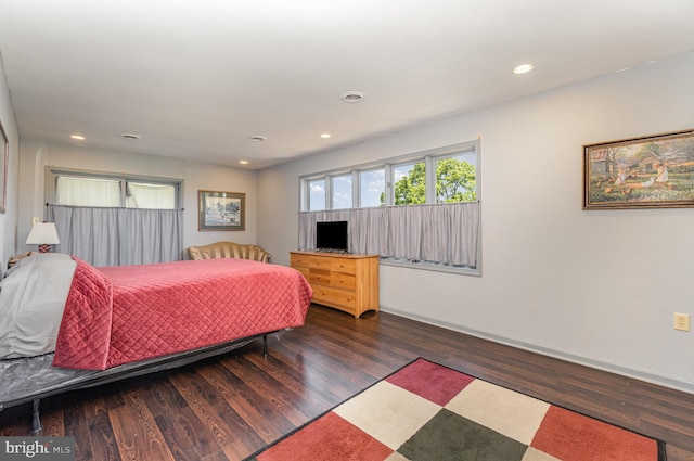 bedroom featuring dark wood-type flooring