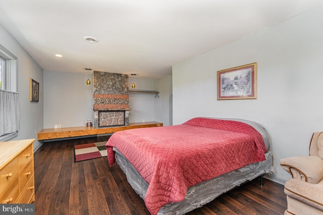 bedroom featuring dark hardwood / wood-style flooring