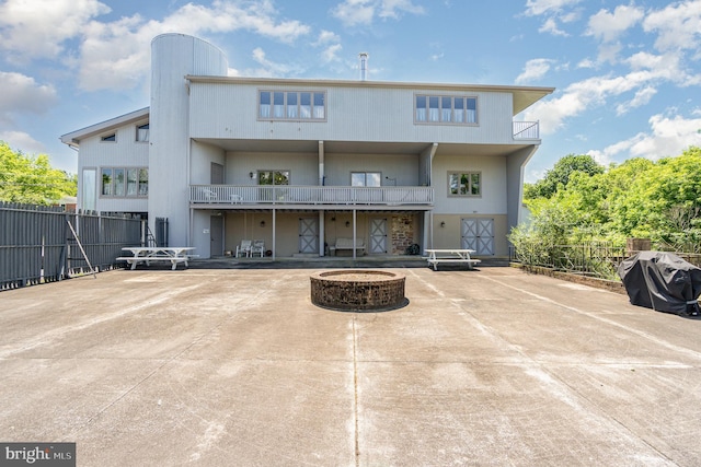 rear view of property featuring a patio area