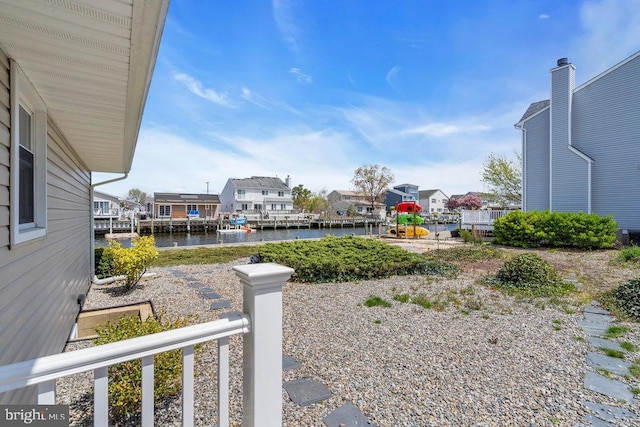 view of yard featuring a water view