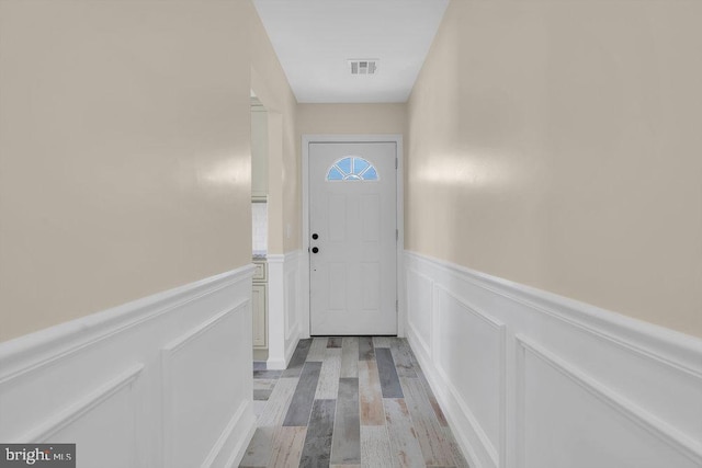 doorway to outside with light hardwood / wood-style flooring