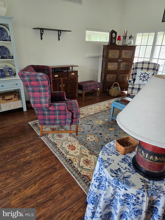 living room featuring dark hardwood / wood-style flooring