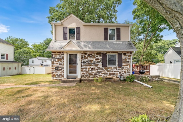 view of front property with a front lawn