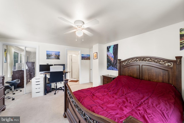 carpeted bedroom with a closet and ceiling fan