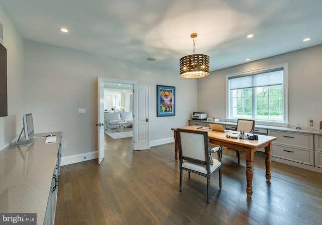 office space featuring dark wood-type flooring