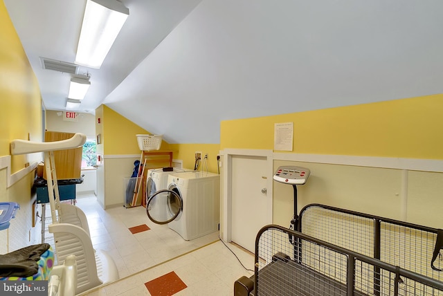 laundry room with washing machine and clothes dryer