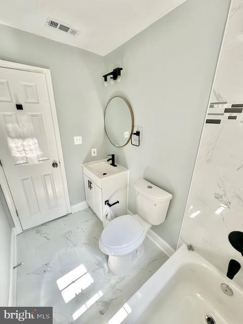 full bathroom with vanity, toilet, and shower / washtub combination