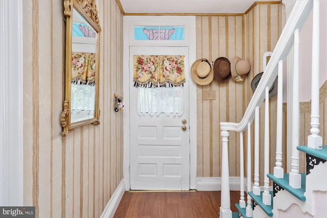 doorway with hardwood / wood-style floors