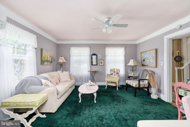 living room featuring crown molding, carpet flooring, and ceiling fan