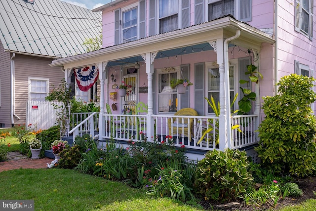 entrance to property with a porch