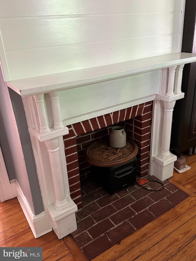 interior details featuring hardwood / wood-style floors