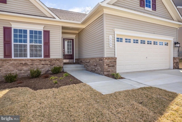 entrance to property with a yard