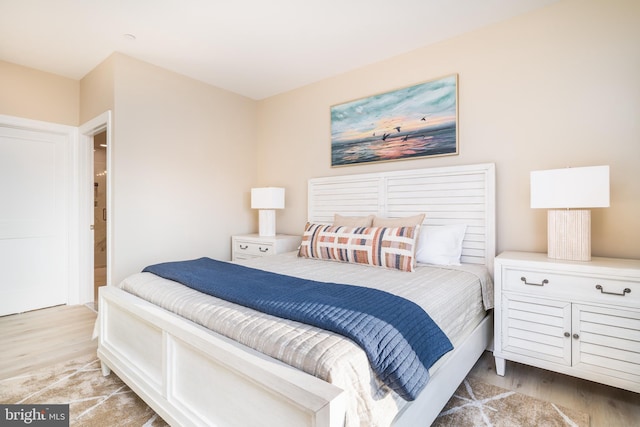 bedroom with light hardwood / wood-style floors