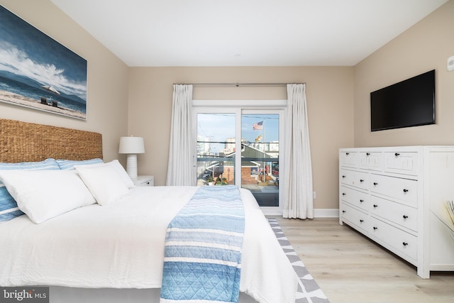 bedroom with light wood-type flooring