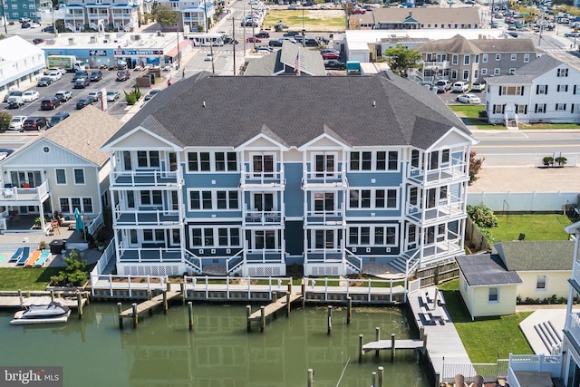 drone / aerial view featuring a water view