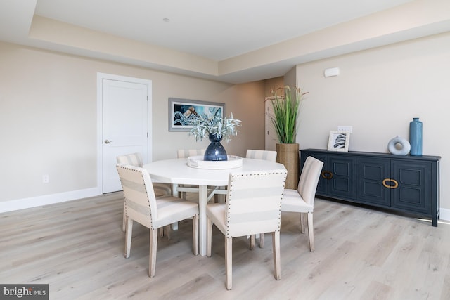 dining space featuring light hardwood / wood-style flooring