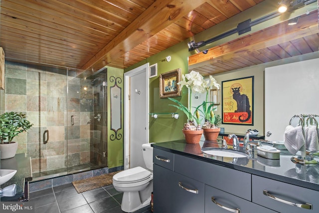 bathroom with beamed ceiling, tile patterned floors, toilet, a shower with door, and vanity