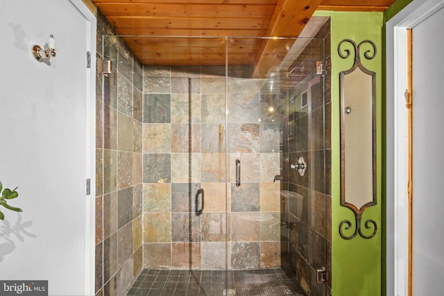 bathroom featuring an enclosed shower and wooden ceiling