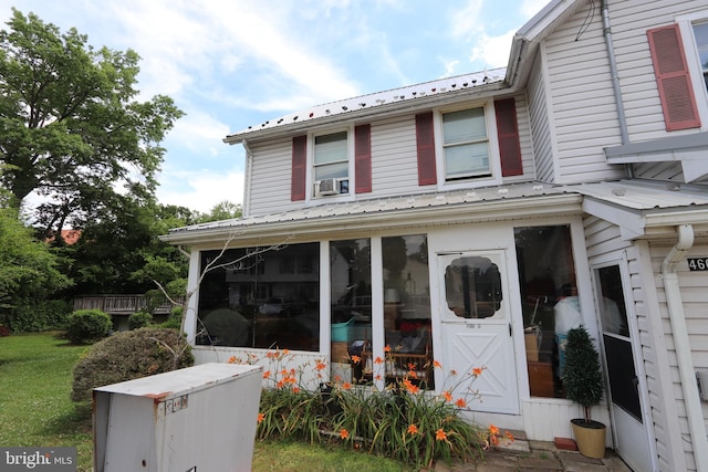 view of front of house with cooling unit