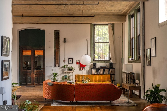 interior space featuring plenty of natural light, wood ceiling, and hardwood / wood-style flooring