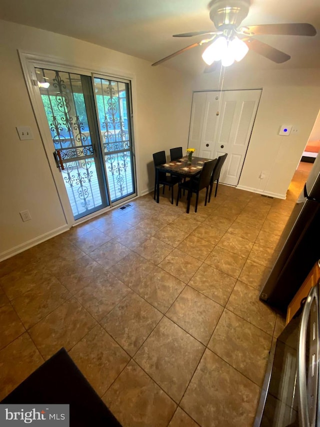 7200 Havre Turn Turn, Upper Marlboro, MD 20772 - tiled dining space featuring ceiling fan and baseboards