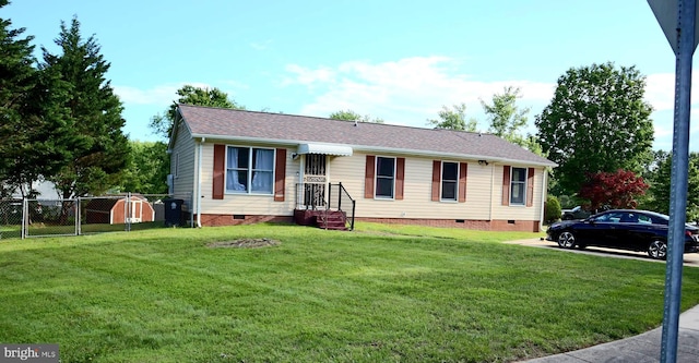 view of front facade with a front yard