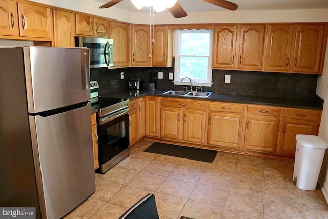 7200 Havre Turn Turn, Upper Marlboro, MD 20772 - kitchen with appliances with stainless steel finishes, a ceiling fan, tasteful backsplash, and dark countertops