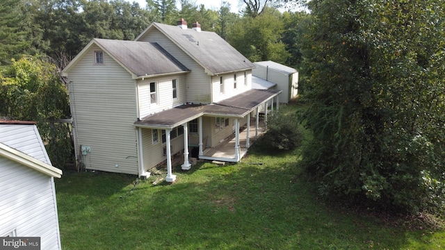 61AND63 Dune Dr, North East, MD 21901 - rear view of house with a lawn