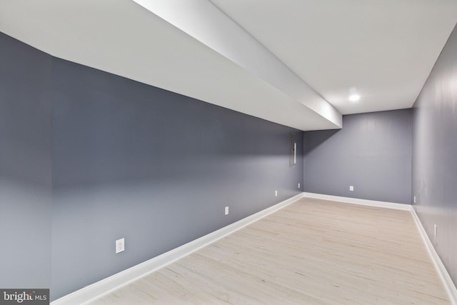 basement featuring light hardwood / wood-style floors