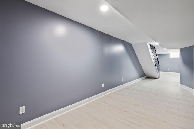 basement featuring light hardwood / wood-style flooring