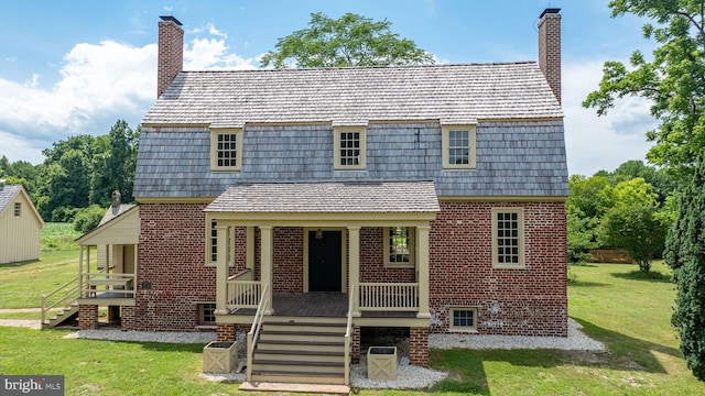 view of front of home with a front yard