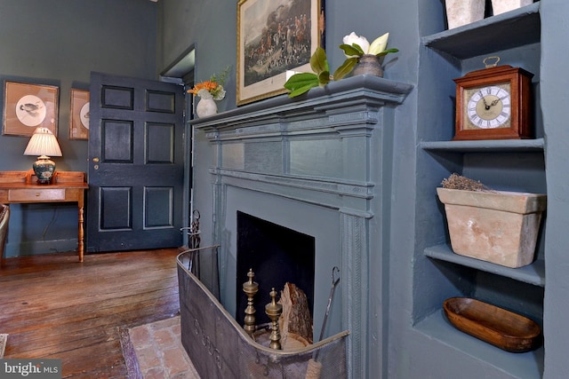 sitting room featuring hardwood / wood-style floors