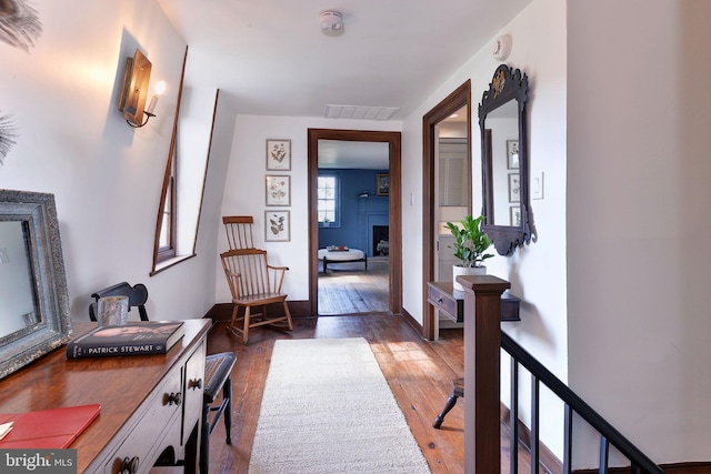 hall featuring dark hardwood / wood-style floors