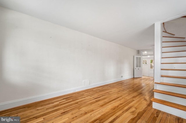 unfurnished room with light hardwood / wood-style flooring