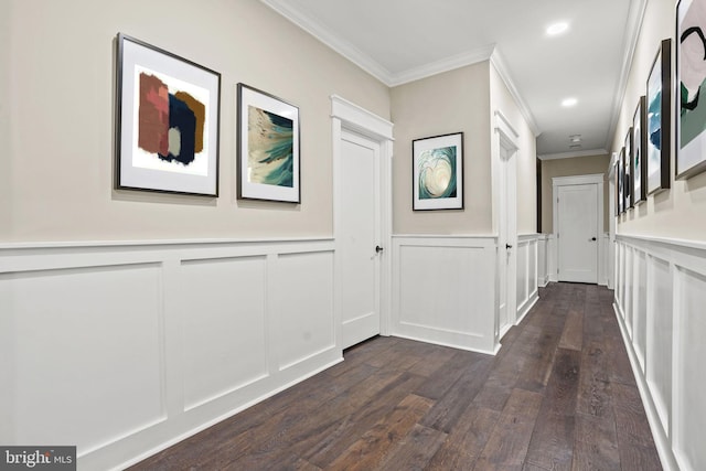 hall featuring crown molding and dark hardwood / wood-style flooring