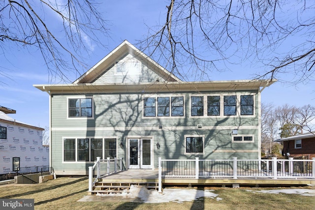 view of front of home featuring a wooden deck