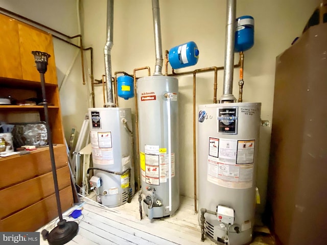 utility room with water heater