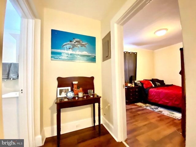 bedroom with hardwood / wood-style floors