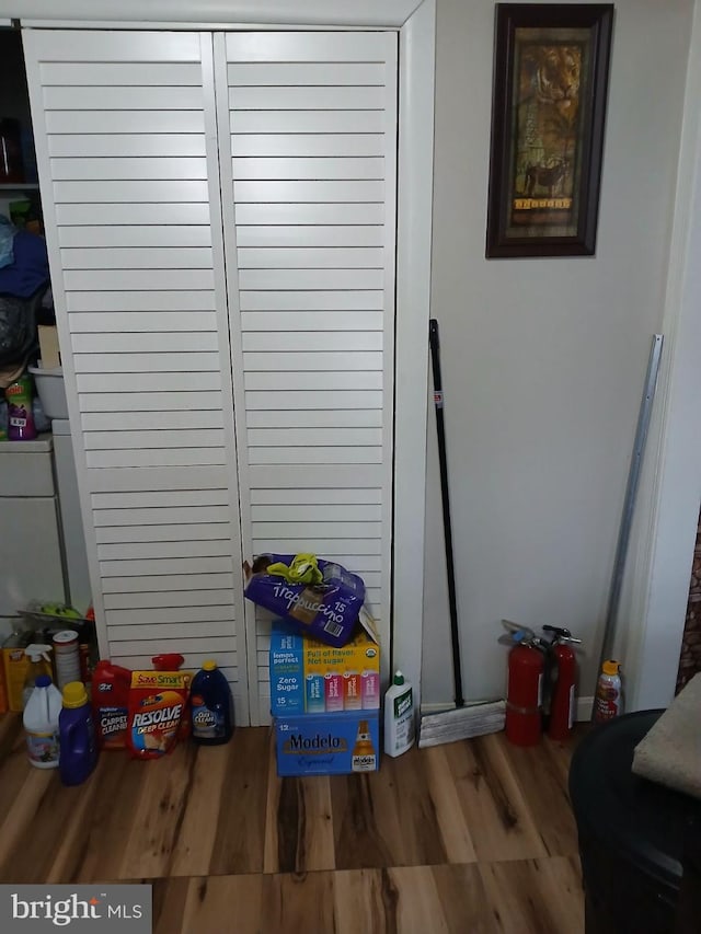 7304 Malden Ln, District Heights, MD 20747 - detailed view of a fire extinguisher and wood finished floors