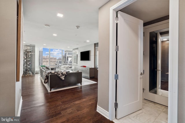 hallway featuring hardwood / wood-style floors