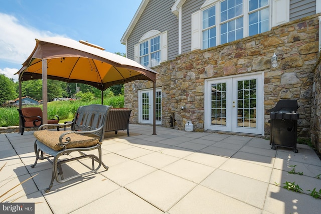 view of patio / terrace featuring a gazebo and french doors