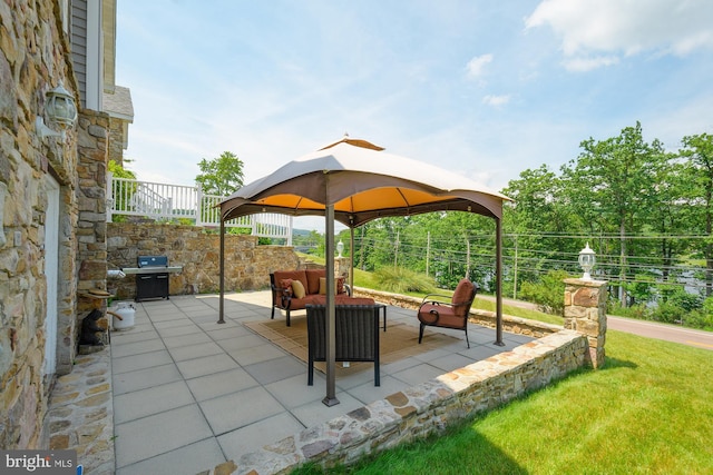 view of patio / terrace with a gazebo, an outdoor hangout area, and area for grilling