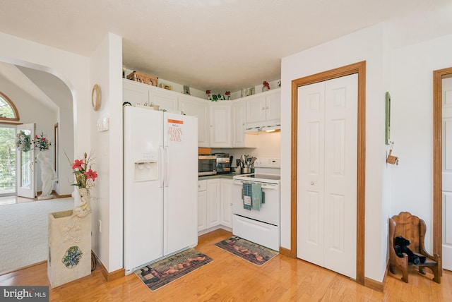 kitchen featuring extractor fan, white cabinetry, light hardwood / wood-style floors, and white appliances