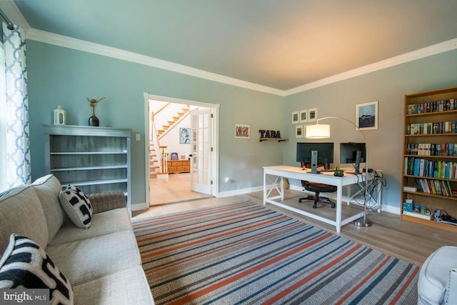 office with wood finished floors, baseboards, and ornamental molding