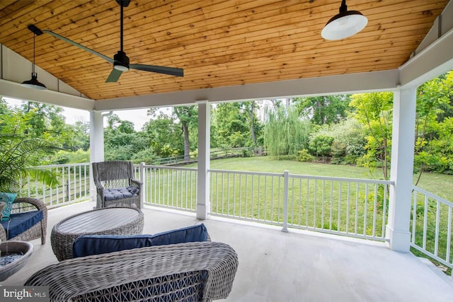 view of patio featuring ceiling fan