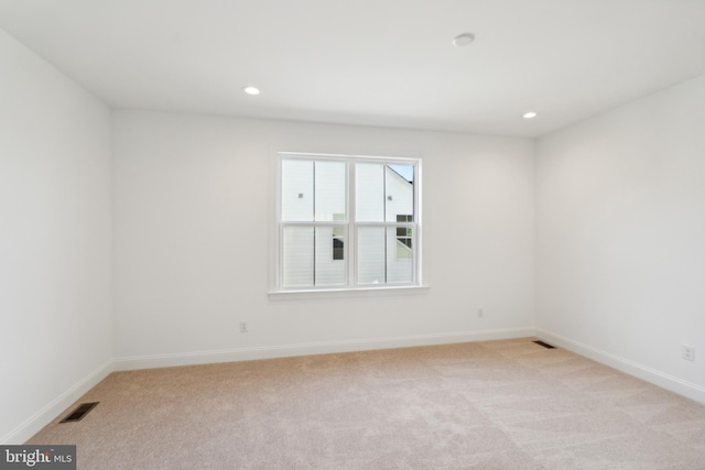 view of carpeted spare room