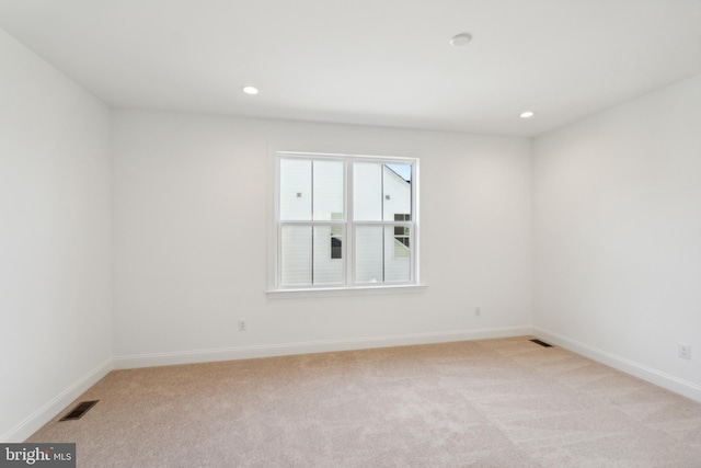 5095 Maple Ridge Way, Emmaus, PA 18049 - empty room with light colored carpet, baseboards, and recessed lighting